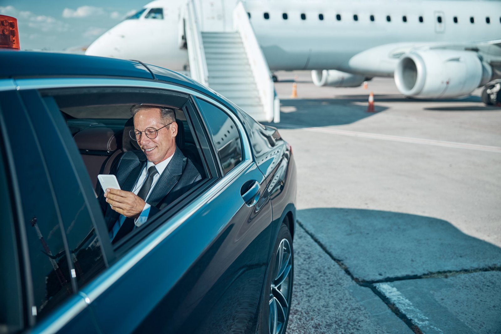 Professional chauffeur at airport